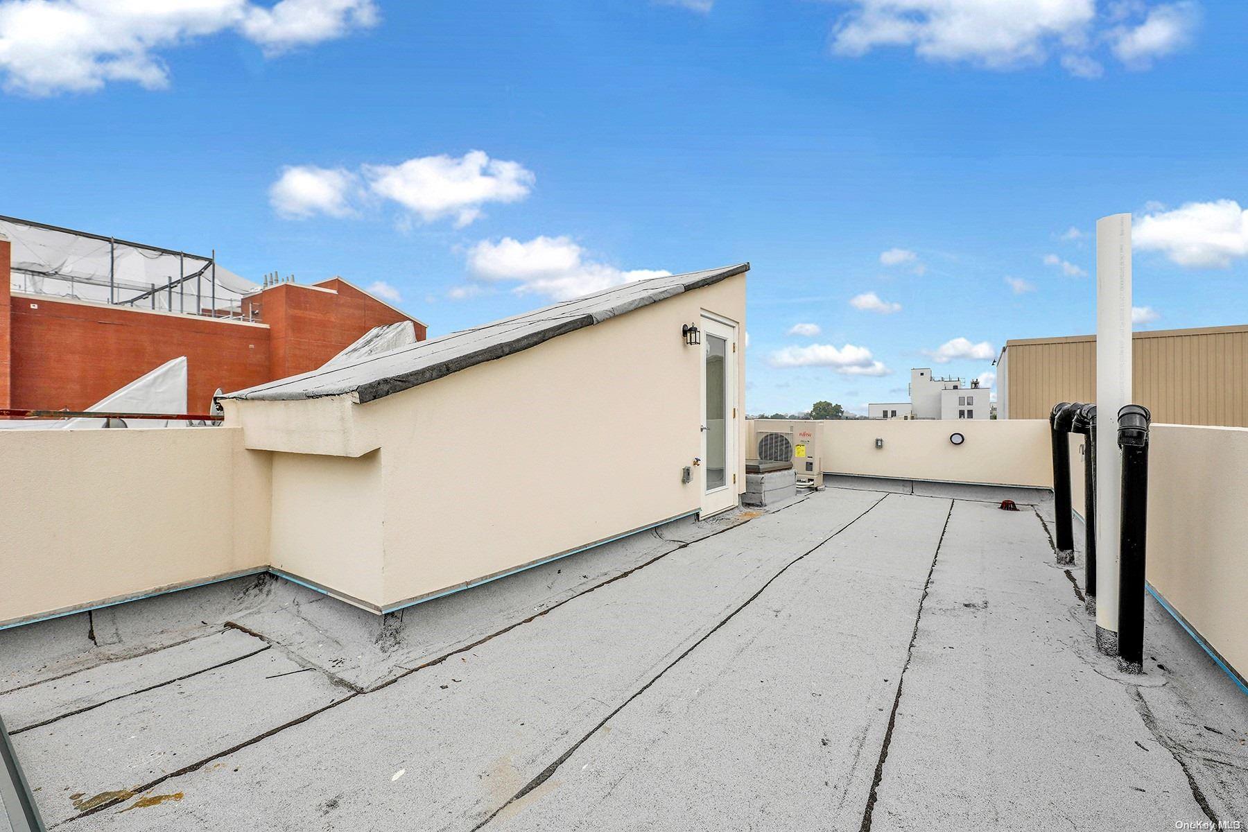 1511 Pacific Street Brooklyn, NY 11213 - Photo 25 of 31 a view of a street with a garage