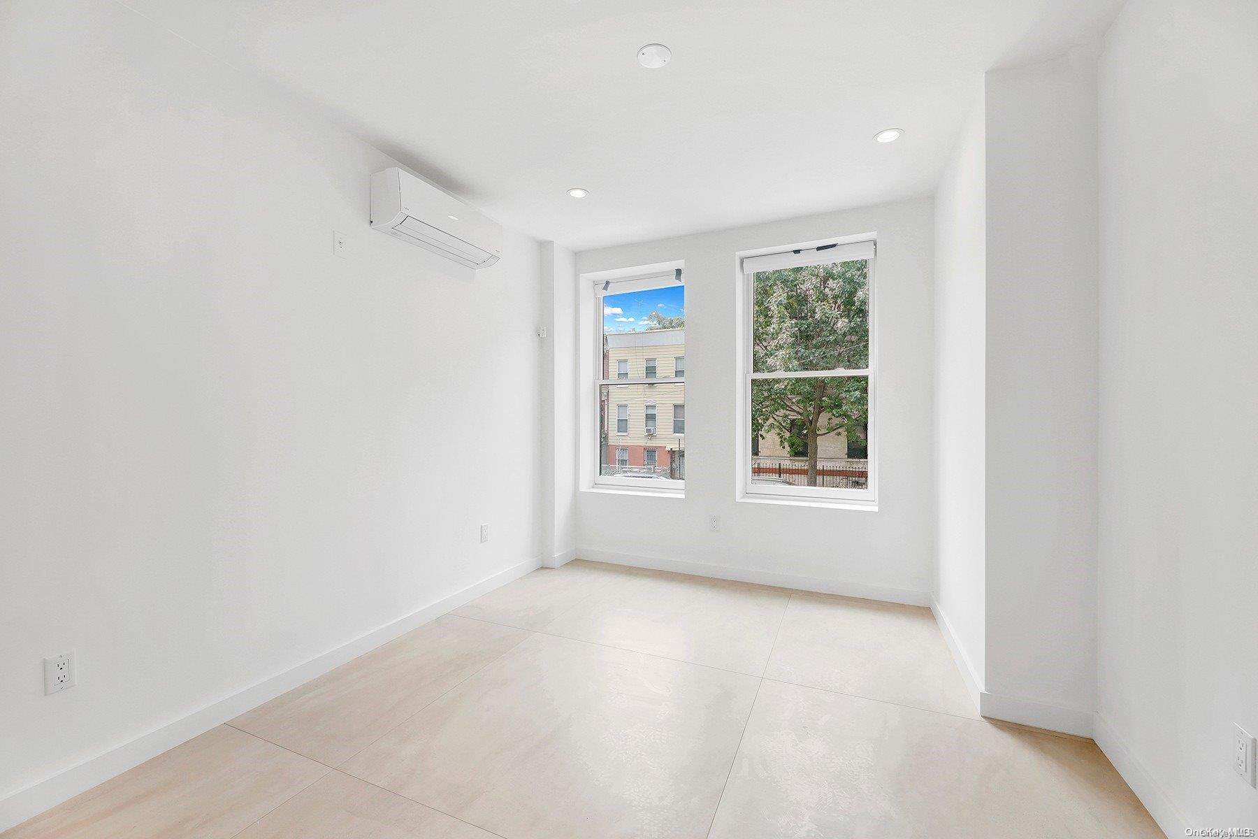 1511 Pacific Street Brooklyn, NY 11213 - Photo 26 of 31 a view of an empty room with a window