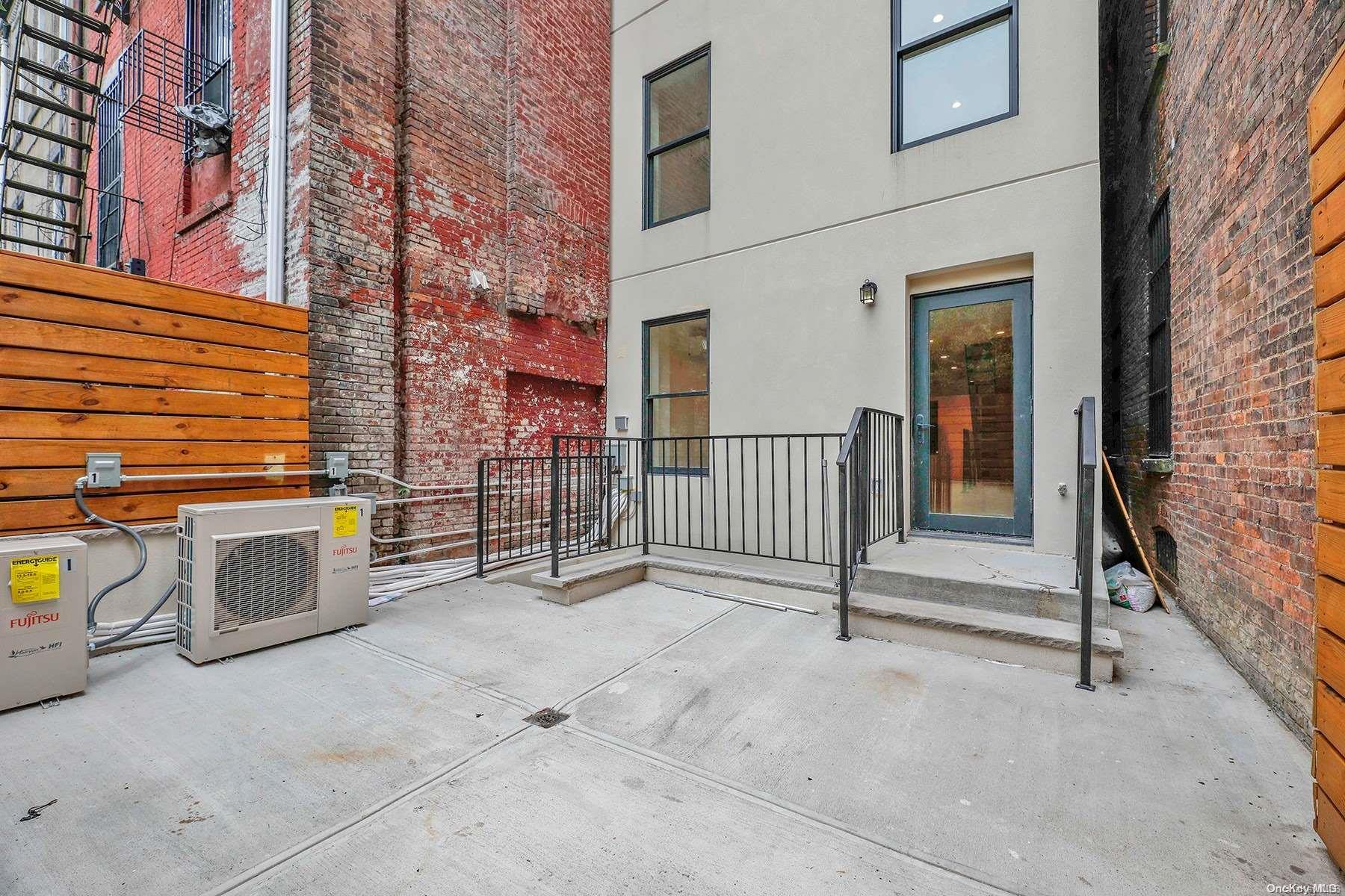 1511 Pacific Street Brooklyn, NY 11213 - Photo 30 of 31 a view of a porch with furniture