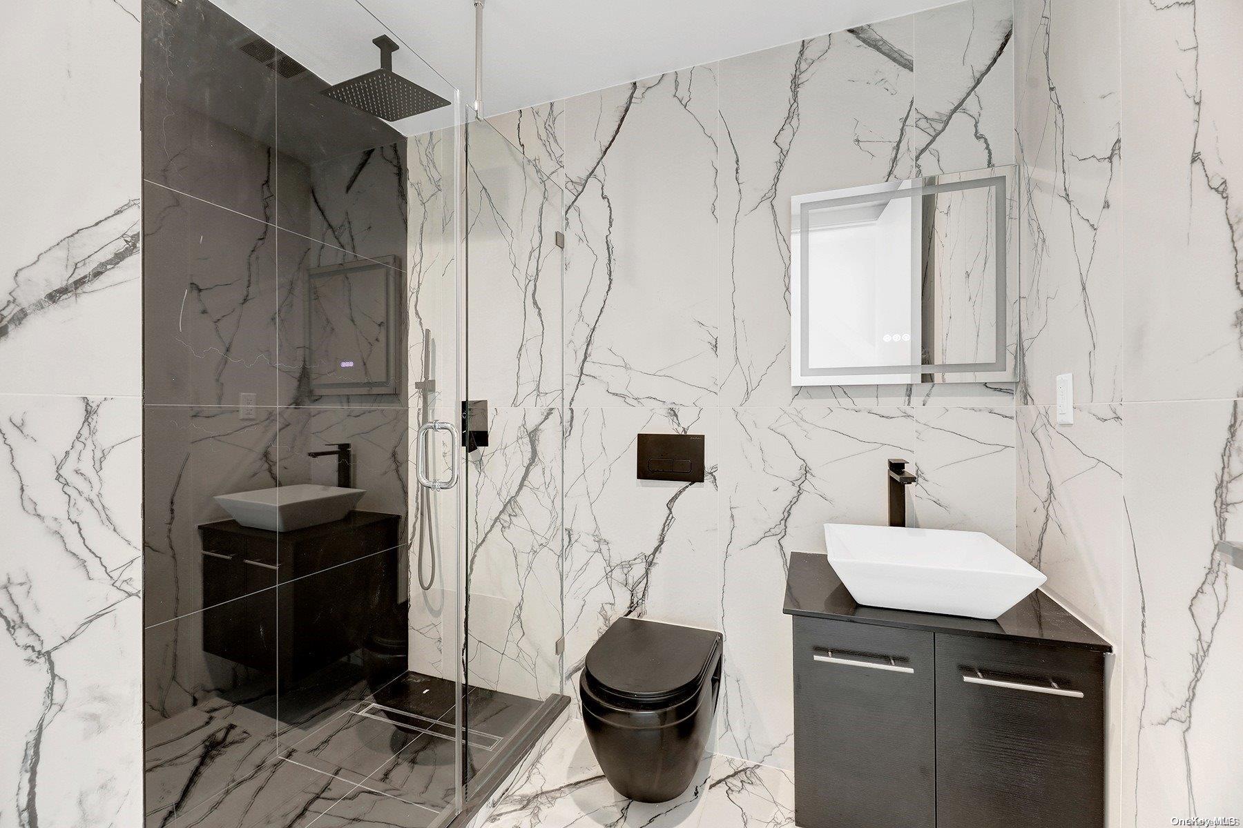 1511 Pacific Street Brooklyn, NY 11213 - Photo 3 of 31 a bathroom with a sink toilet and shower