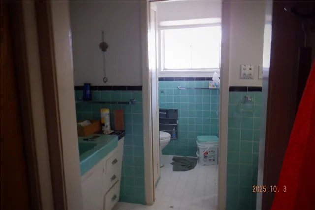 a bathroom with a sink and a shower