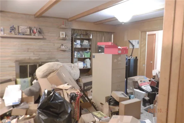 a room with furniture and a fireplace