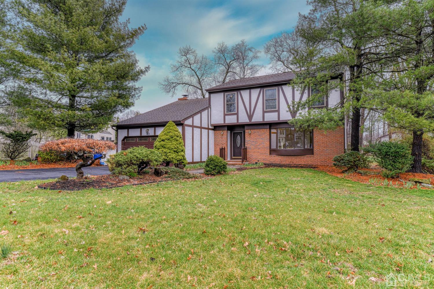 43 Pinecrest Road Somerset, NJ 08873 - Photo 2 of 34 a view of a house with a yard and plants