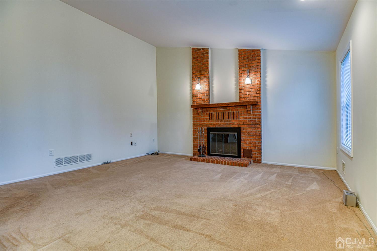 43 Pinecrest Road Somerset, NJ 08873 - Photo 19 of 34 a view of empty room with a fireplace