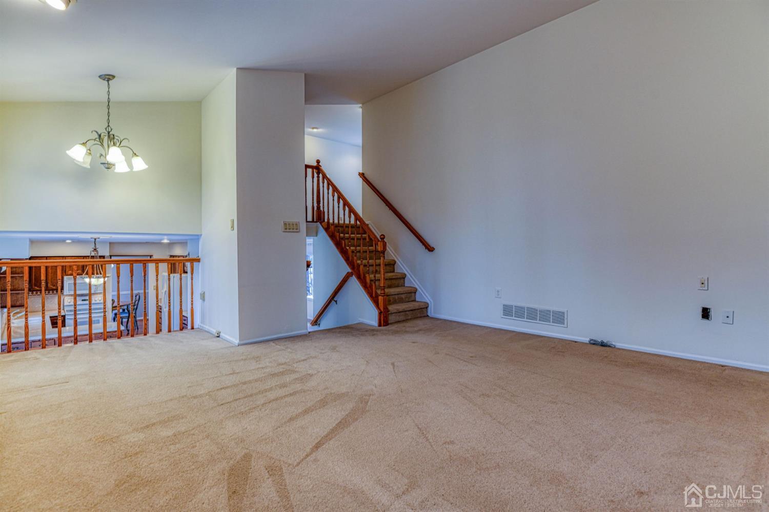 43 Pinecrest Road Somerset, NJ 08873 - Photo 20 of 34 a view of an empty room with stairs