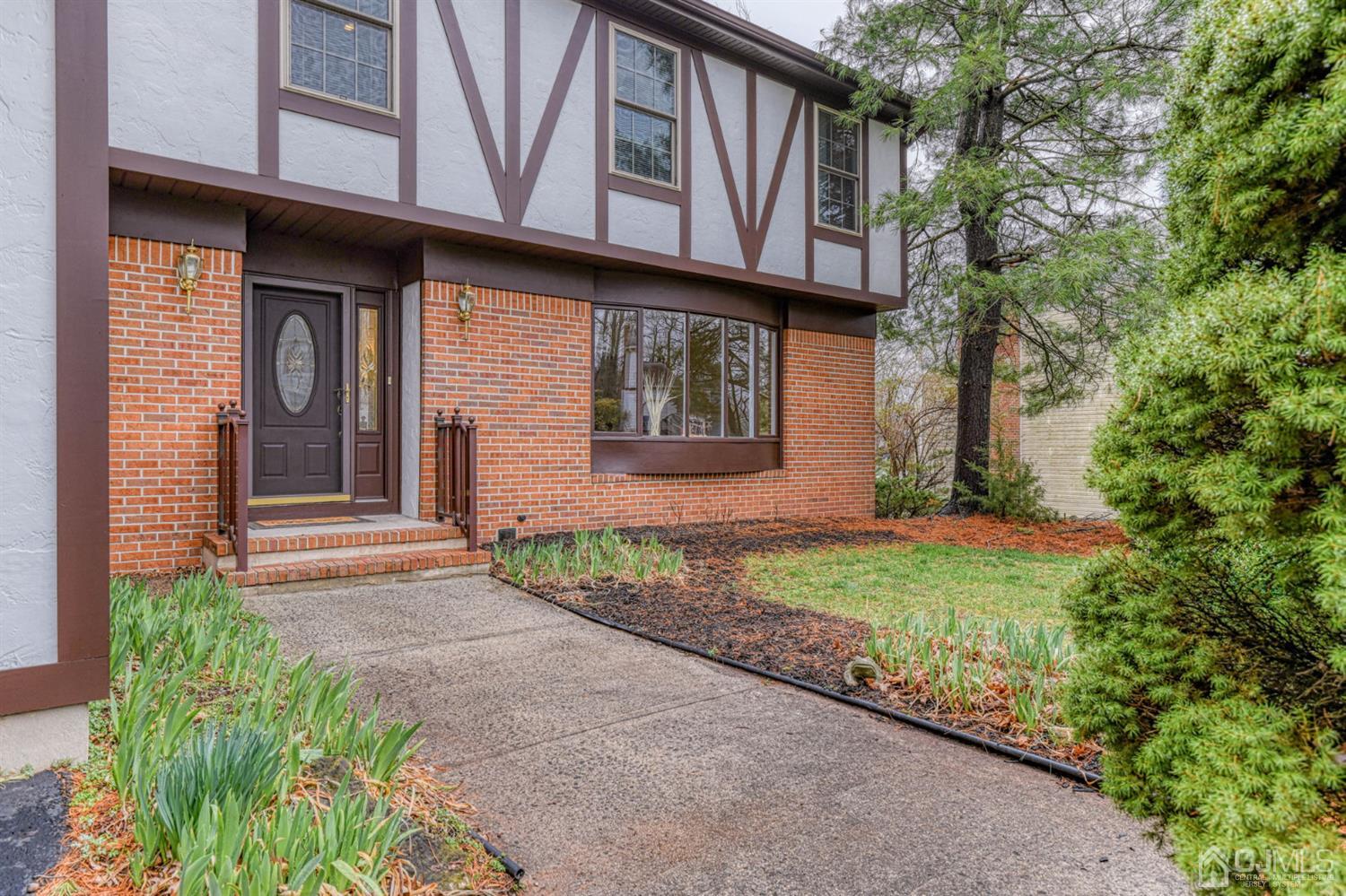 43 Pinecrest Road Somerset, NJ 08873 - Photo 3 of 34 a front view of a house with garden