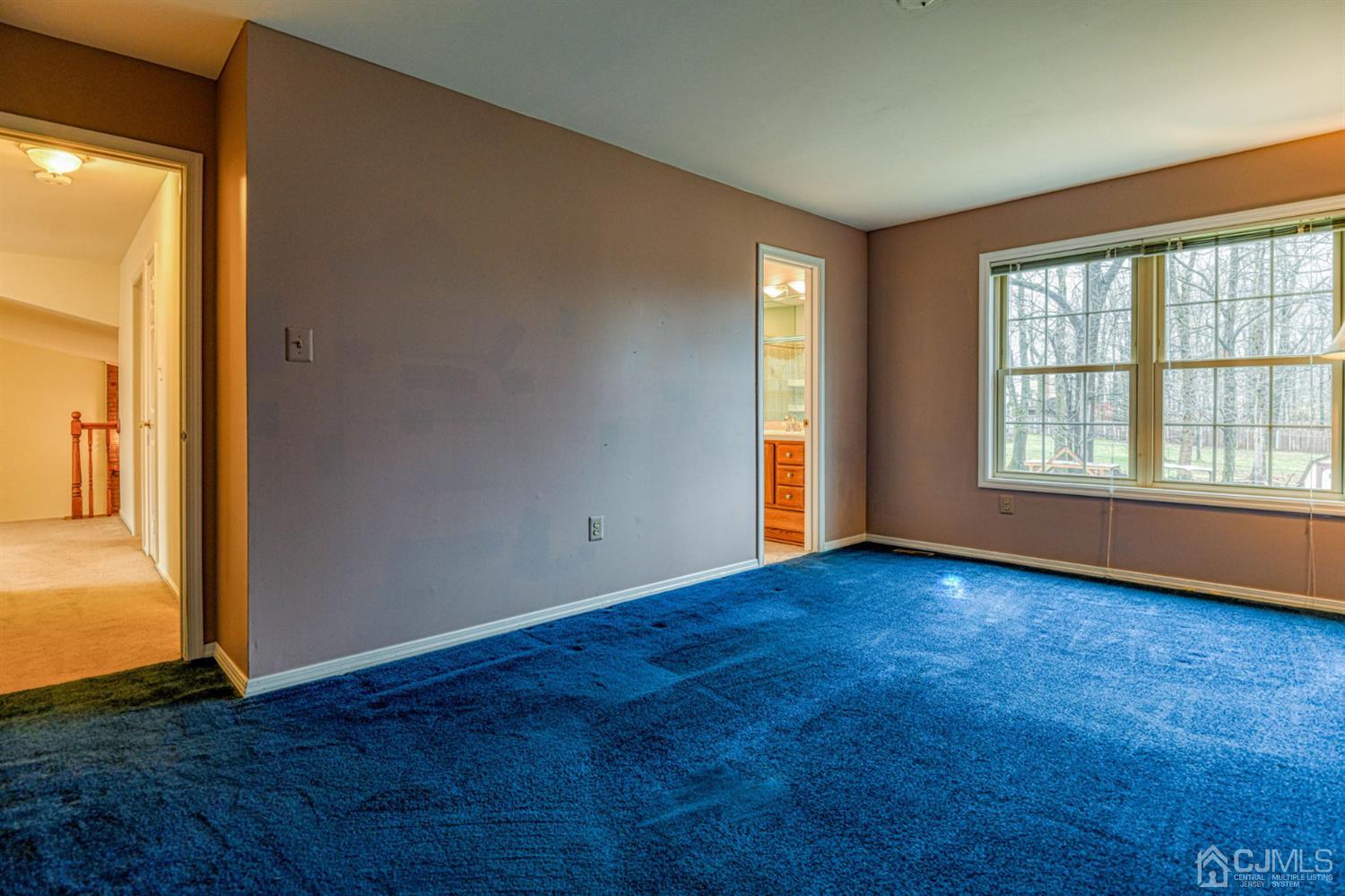 43 Pinecrest Road Somerset, NJ 08873 - Photo 23 of 34 an empty room with wooden floor and windows