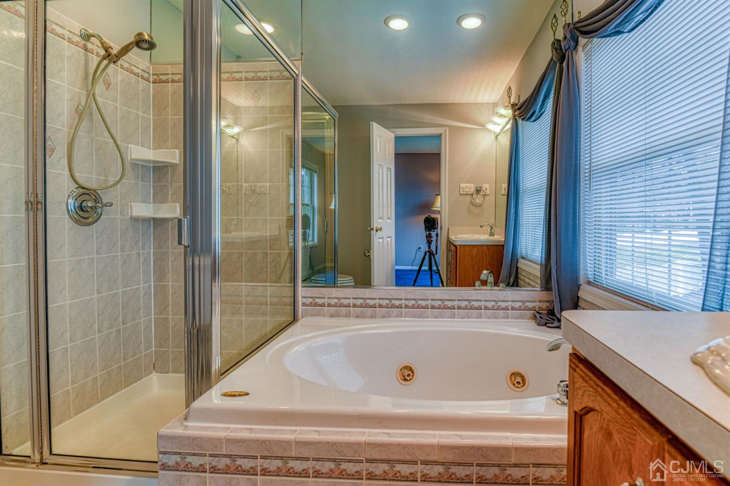 43 Pinecrest Road Somerset, NJ 08873 - Photo 24 of 34 a bathroom with a tub and shower