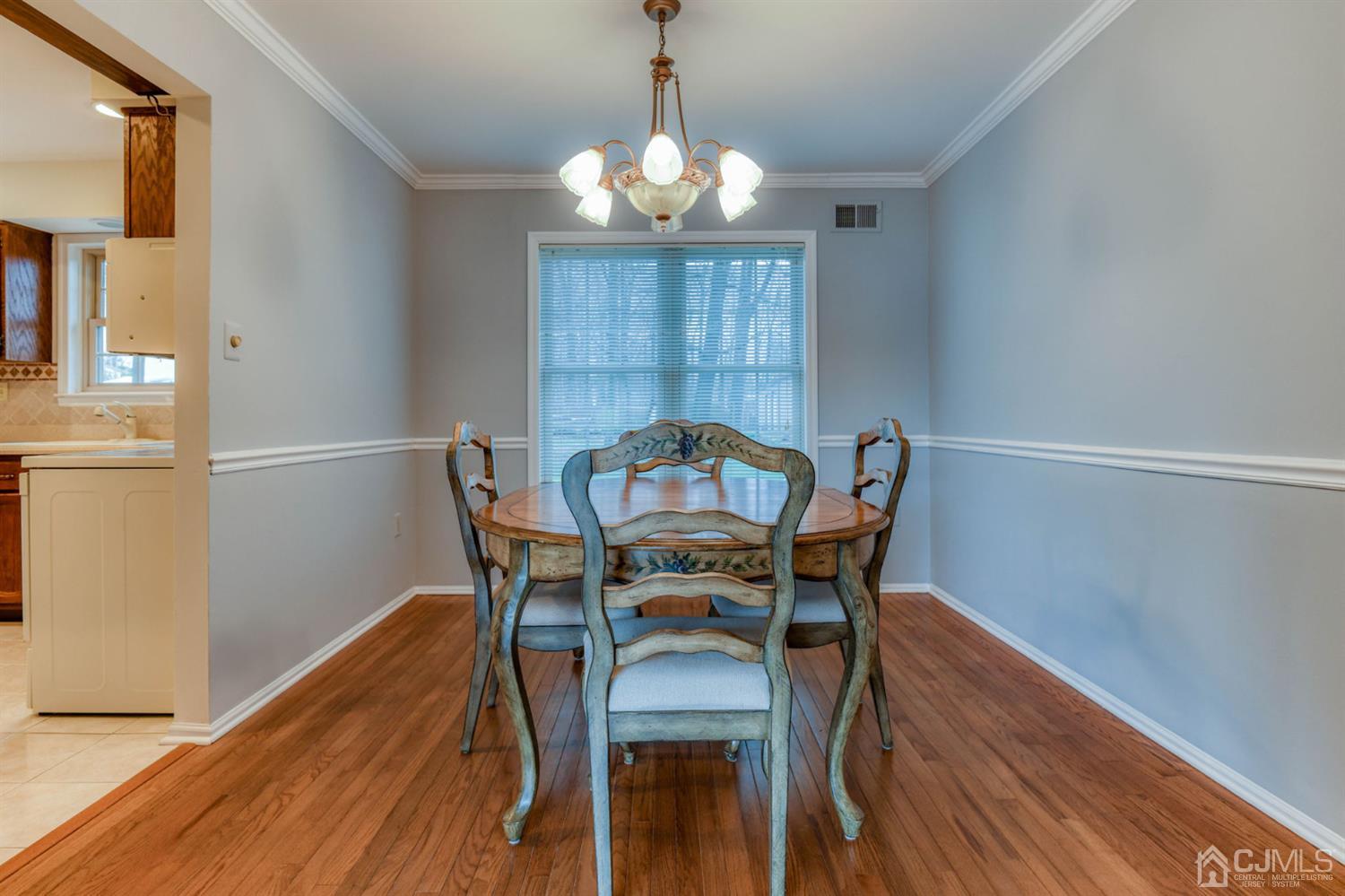 43 Pinecrest Road Somerset, NJ 08873 - Photo 8 of 34 a view of a dining room with furniture window and wooden floor