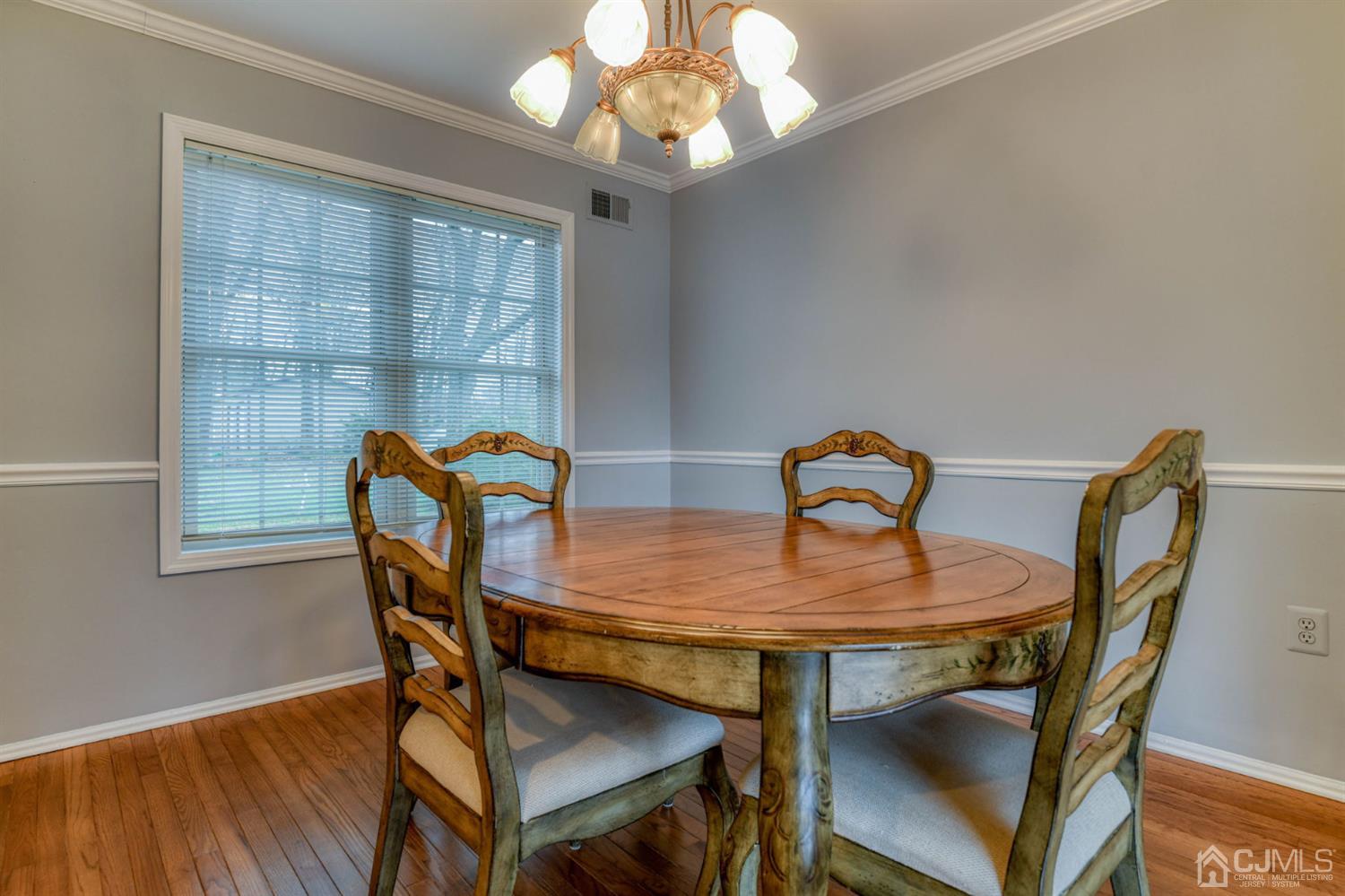 43 Pinecrest Road Somerset, NJ 08873 - Photo 9 of 34 a view of a dining room with furniture and wooden floor