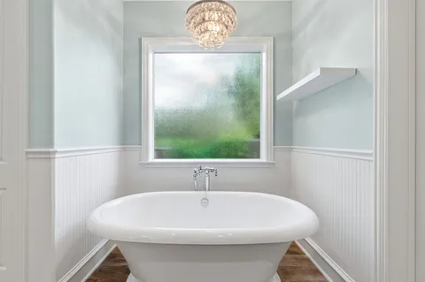 a bathroom with a sink a toilet and vanity