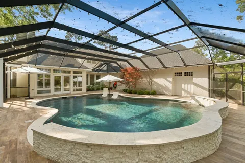 a view of yard with patio