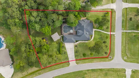 a bathroom with mirror a sink and vanity