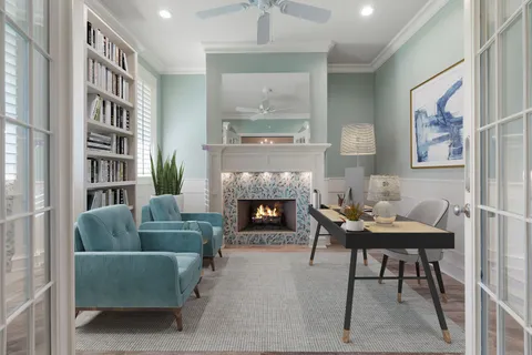 a view of fireplace with a hallway