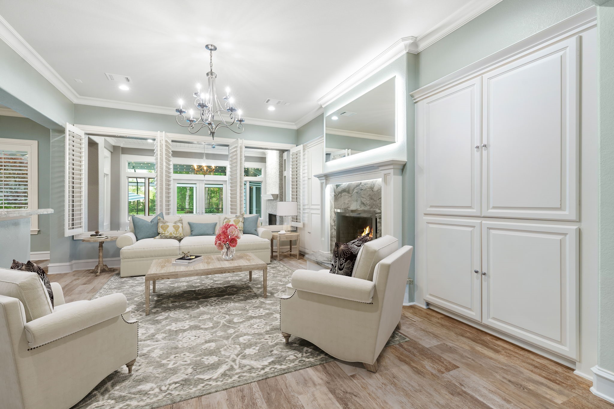 27614 Little Fox Crest Spring, TX 77386 - Photo 10 of 49 a living room with furniture chandelier and a fireplace