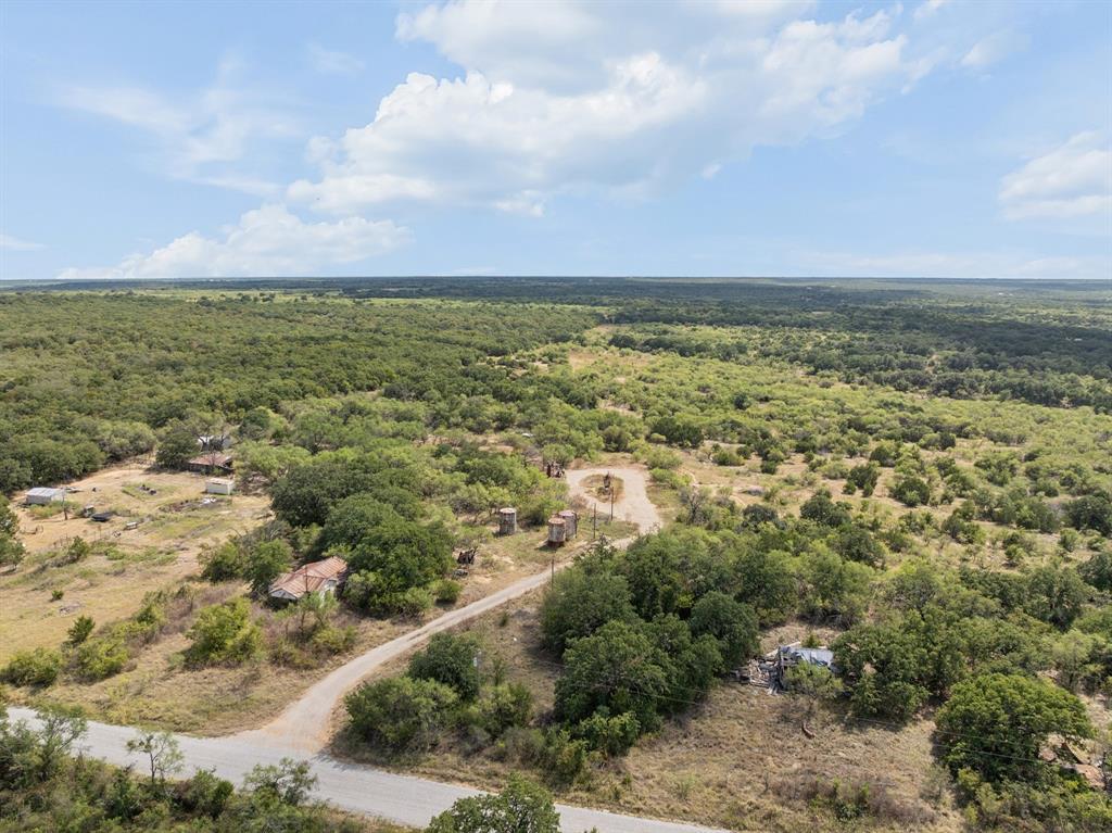 11097 County Road 137 Ranger, TX 76470 - Photo 36 of 40 Expansive acreage featuring abundant mature trees and natural landscaping