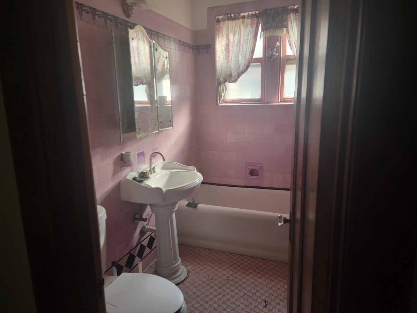 46 North Central Avenue Chicago, IL 60644 - Photo 15 of 24 a bathroom with a sink toilet and a mirror