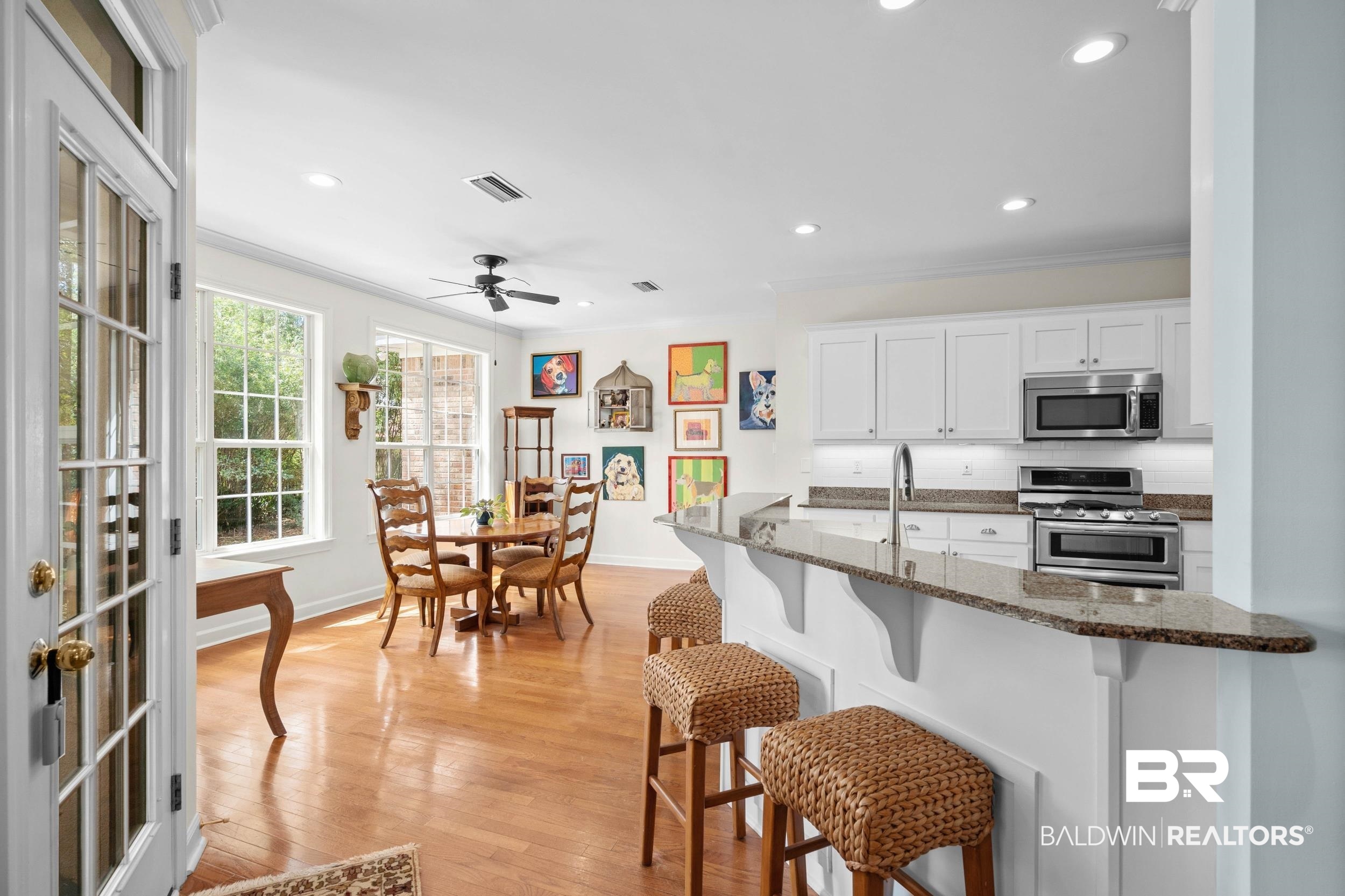104 Pebble Court Fairhope, AL 36532 - Photo 26 of 73 Breakfast bar and area overlooks back yard