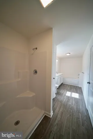 a view of a bathroom with a bathtub