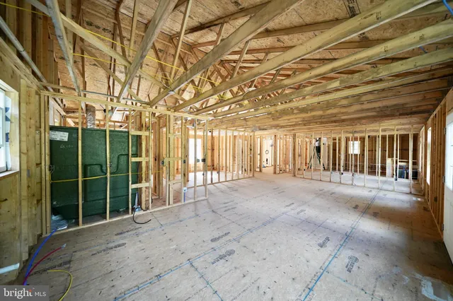 a view of a porch with a wooden fence