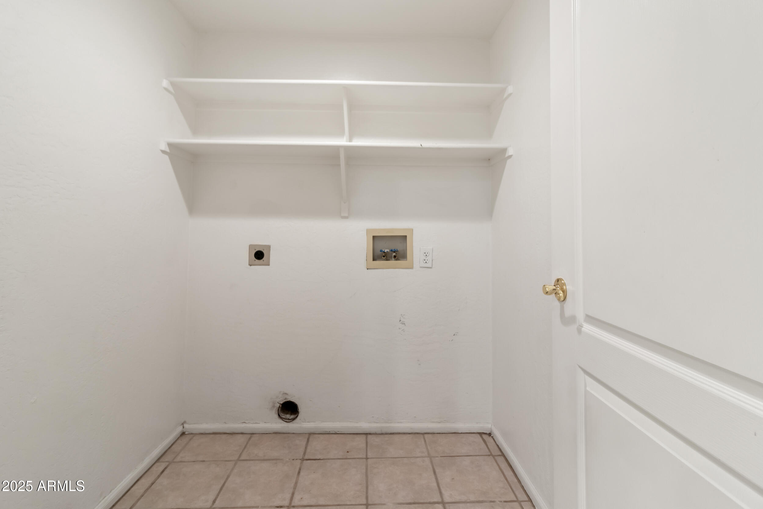 1747 East Northern Avenue, Unit 104 Phoenix, AZ 85020 - Photo 18 of 19 a view of an empty walk in closet