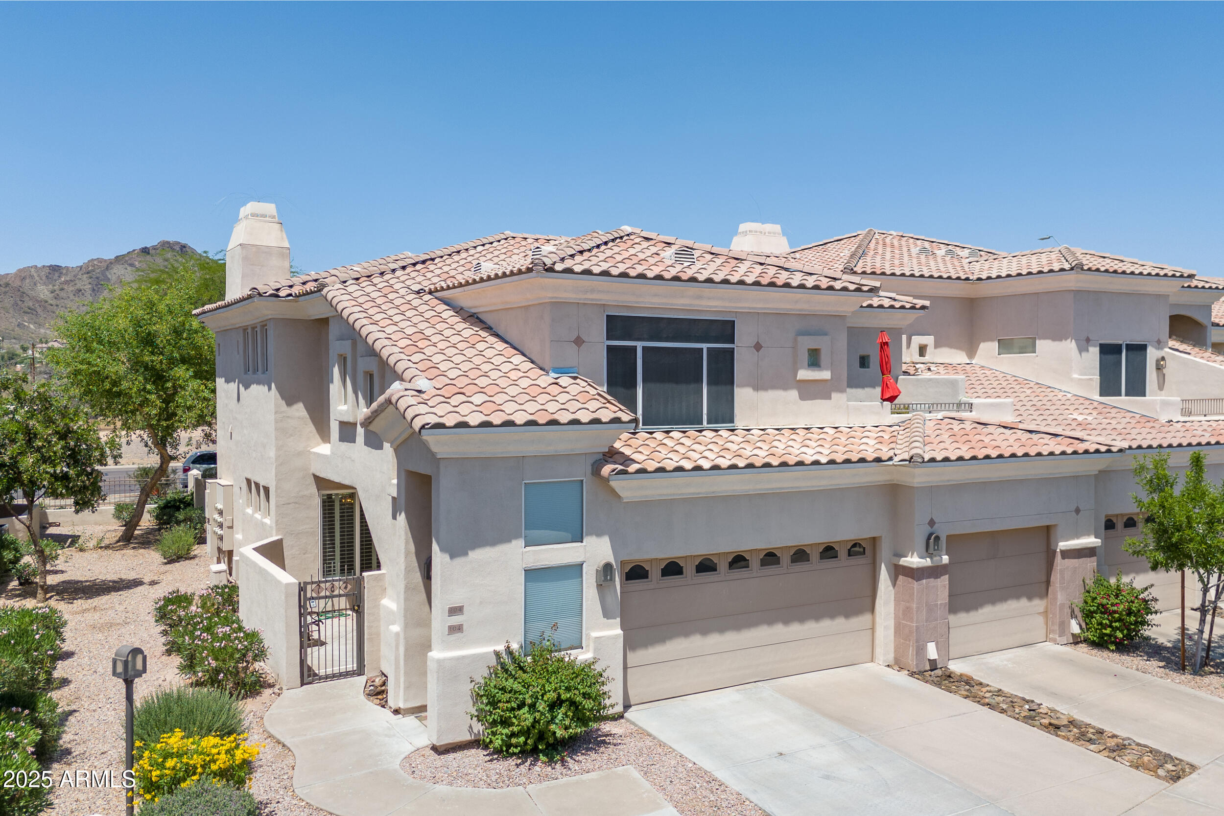 1747 East Northern Avenue, Unit 104 Phoenix, AZ 85020 - Photo 6 of 19 a front view of a house