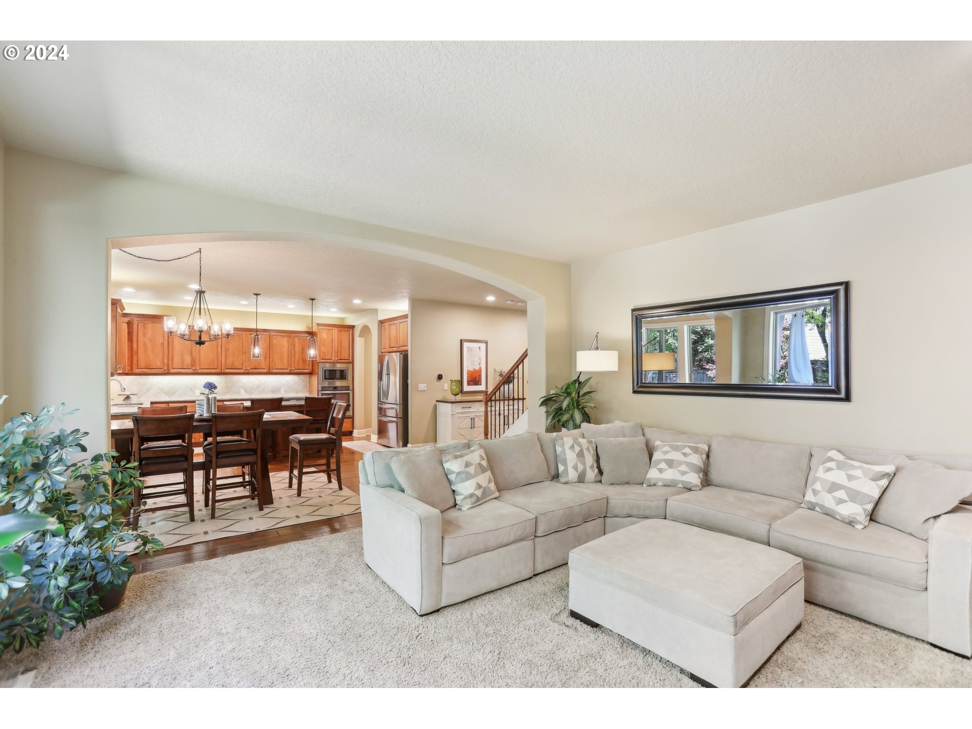 7885 Southwest Daybreak Street Wilsonville, OR 97070 - Photo 16 of 48 a living room with furniture and a table