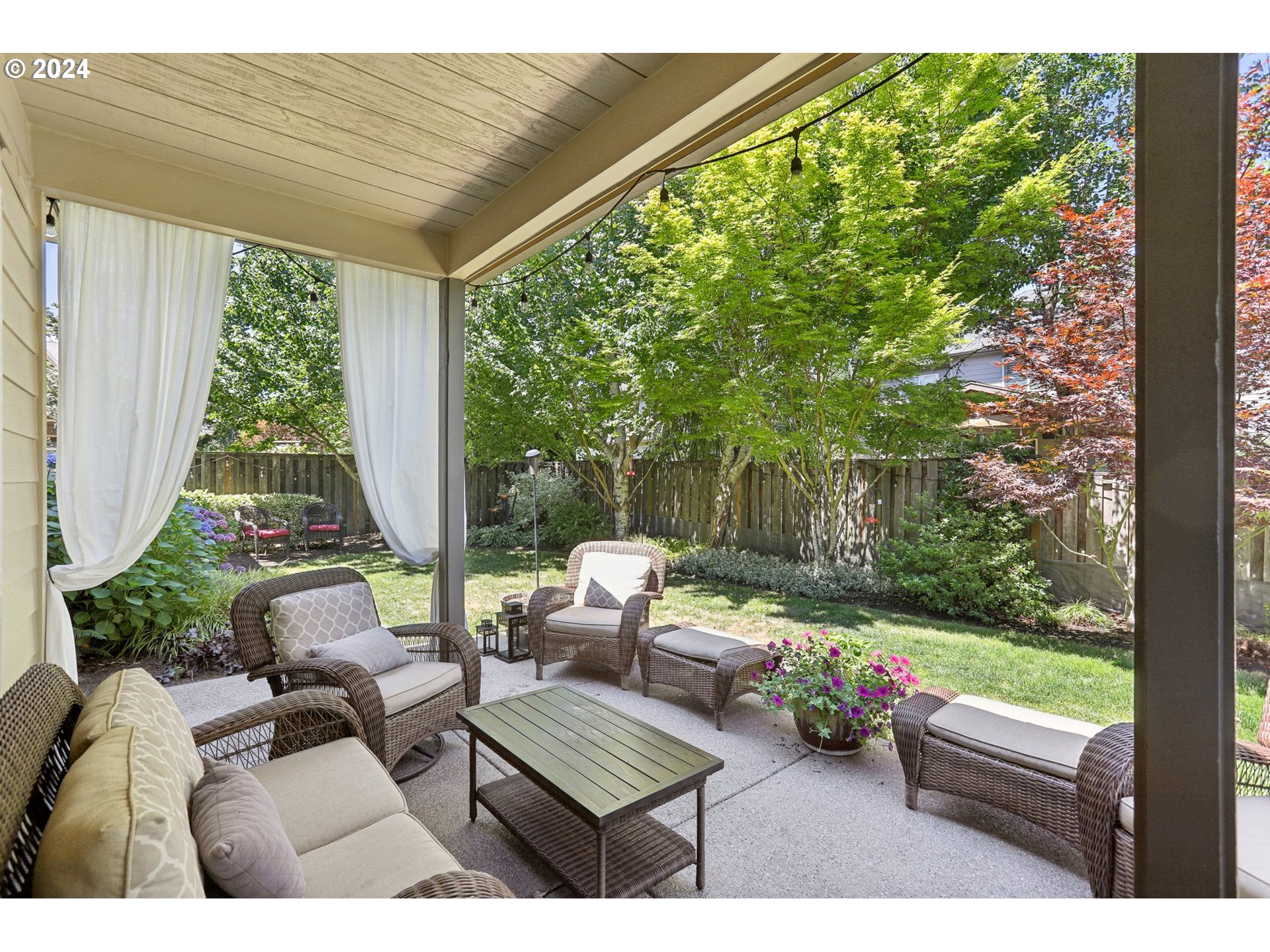 7885 Southwest Daybreak Street Wilsonville, OR 97070 - Photo 41 of 48 a view of yard from deck with patio
