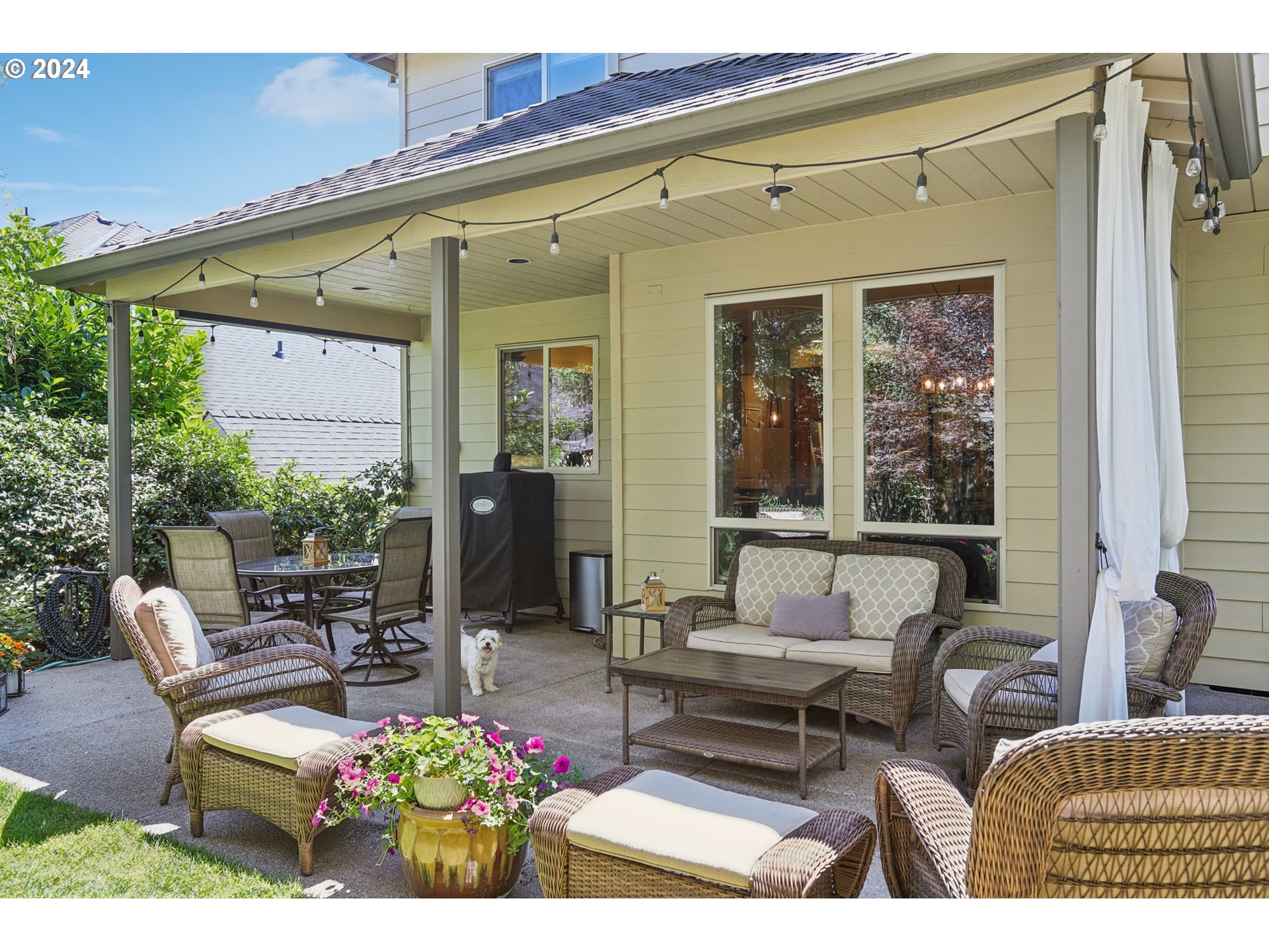 7885 Southwest Daybreak Street Wilsonville, OR 97070 - Photo 43 of 48 a outdoor living space with furniture and a potted plant