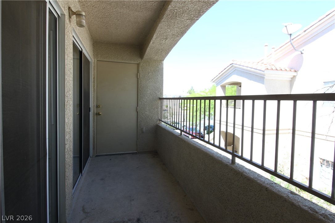 1881 West Alexander Road, Unit 2068 North Las Vegas, NV 89032 - Photo 19 of 22 BALCONY W/ STORAGE CLOSET