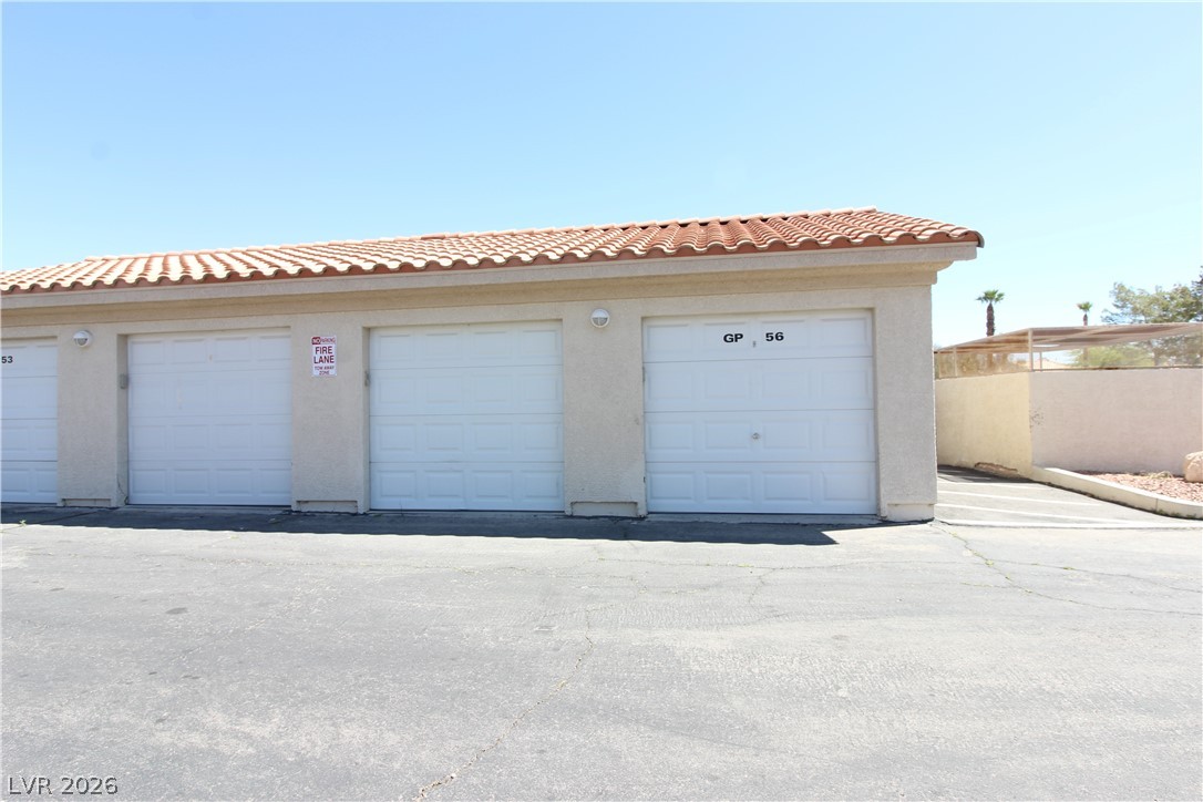 1881 West Alexander Road, Unit 2068 North Las Vegas, NV 89032 - Photo 20 of 22 1 CAR GARAGE W/AUTO OPENER