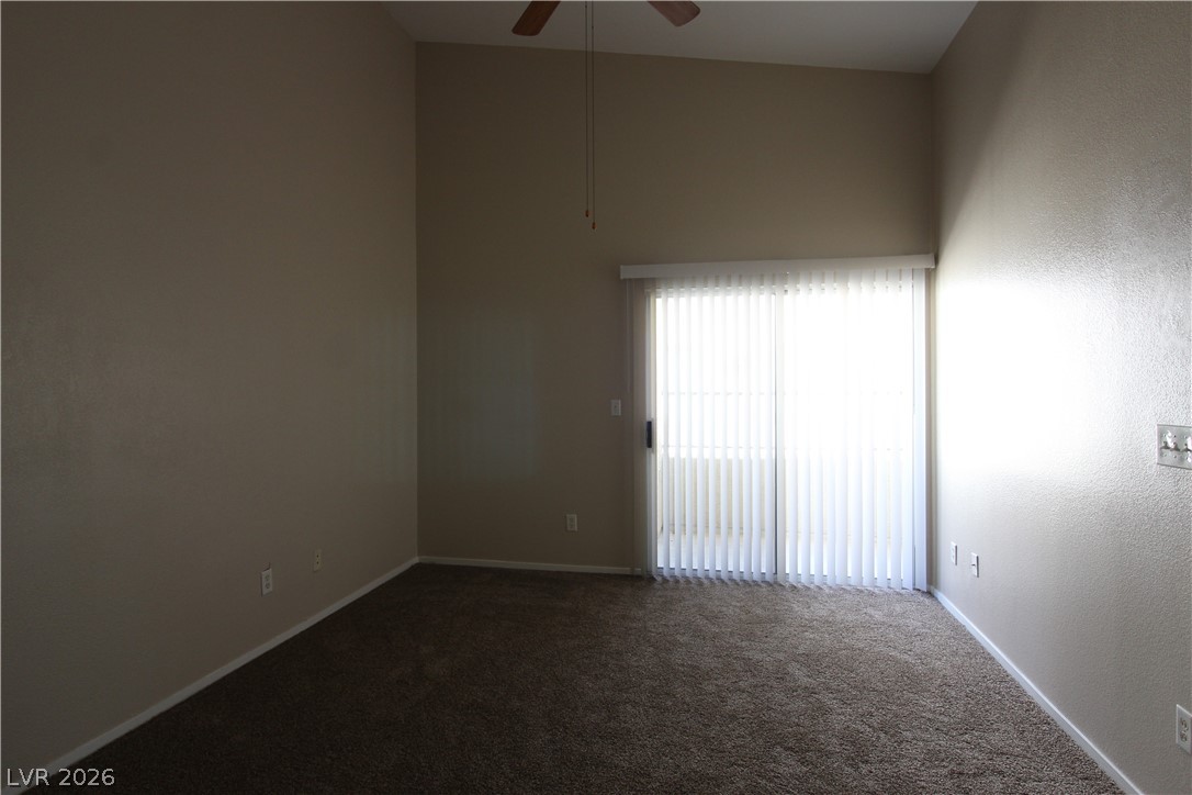 1881 West Alexander Road, Unit 2068 North Las Vegas, NV 89032 - Photo 10 of 22 RIMARY BEDROOM W/BALCONY