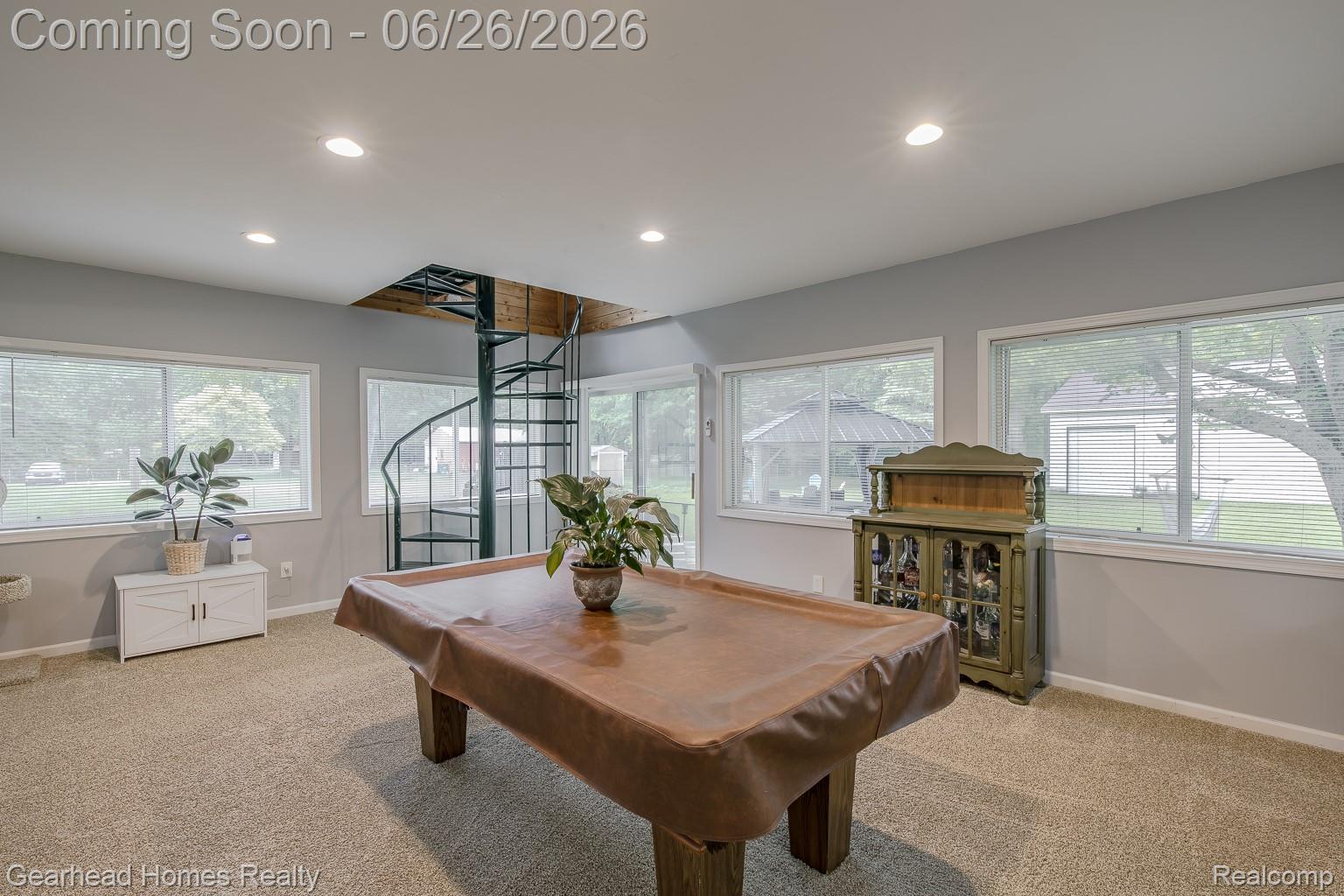 12364 Morrish Road Clio, MI 48420 - Photo 19 of 81 Spacious room with light gray walls, recessed lighting, carpet flooring, and multiple windows providing natural illumination