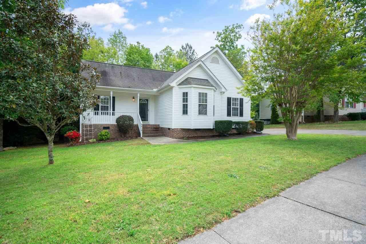 616 Rookwood Court Wake Forest, NC 27587 - Photo 2 of 30 a front view of house with yard and green space