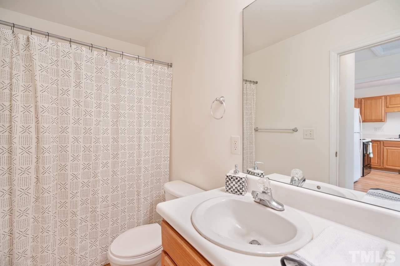 616 Rookwood Court Wake Forest, NC 27587 - Photo 19 of 30 a bathroom with a sink toilet and shower