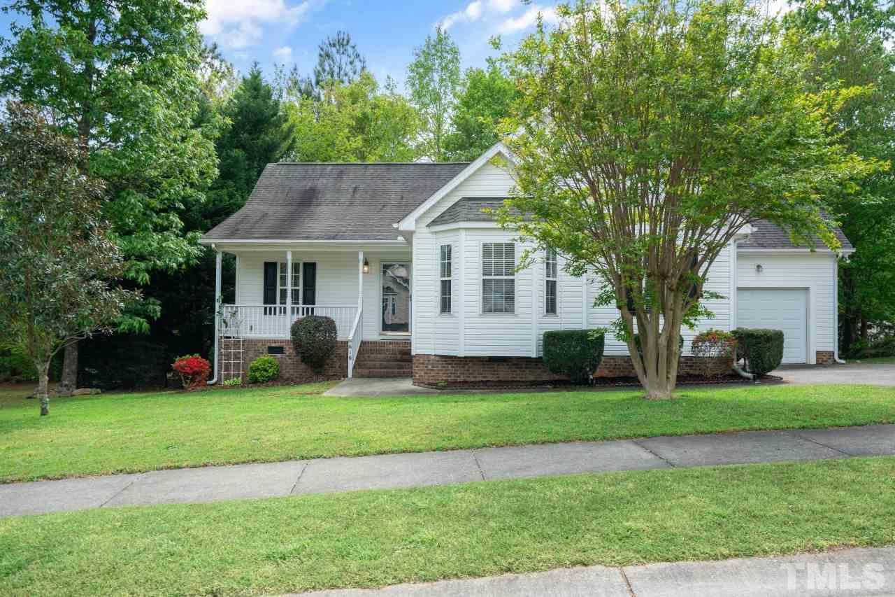 616 Rookwood Court Wake Forest, NC 27587 - Photo 3 of 30 a front view of a house with a yard and garage