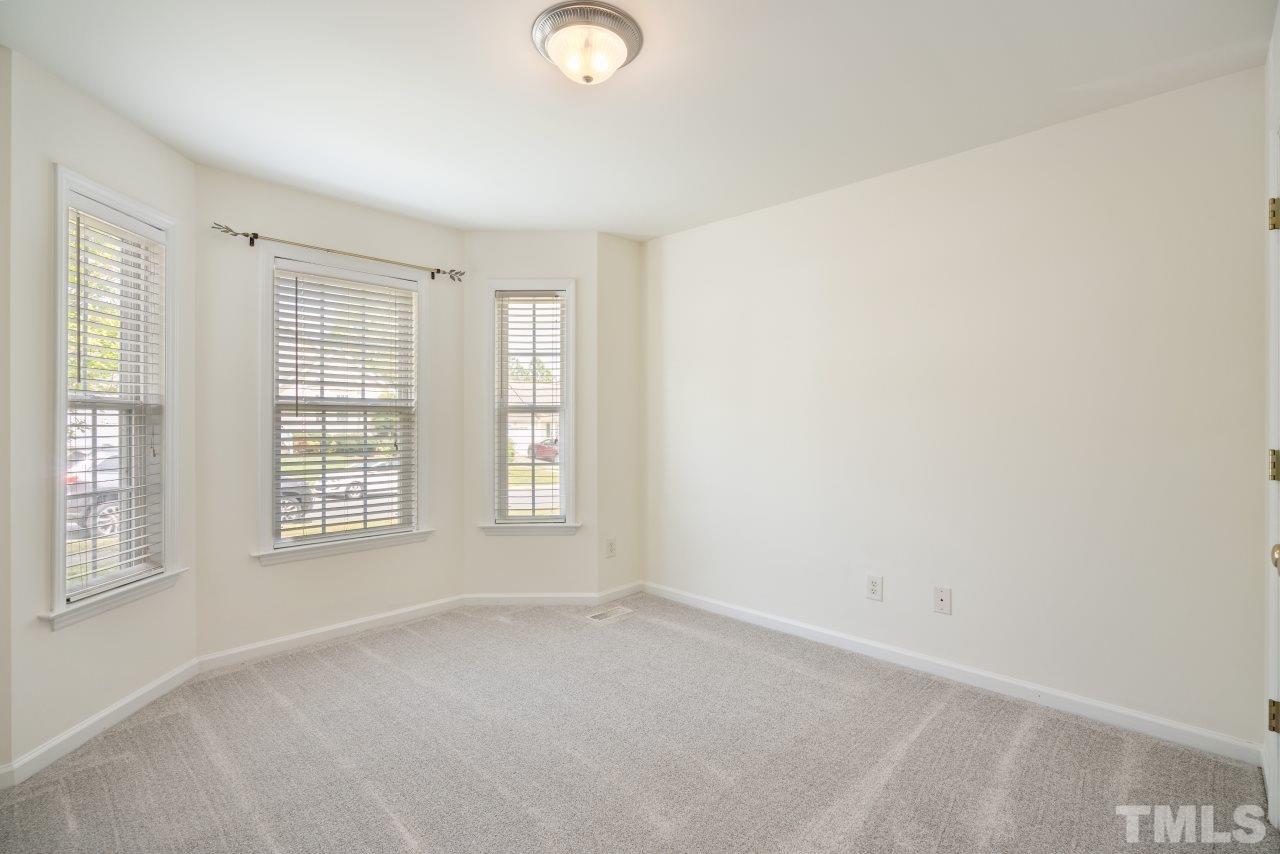 616 Rookwood Court Wake Forest, NC 27587 - Photo 21 of 30 a view of an empty room with a window