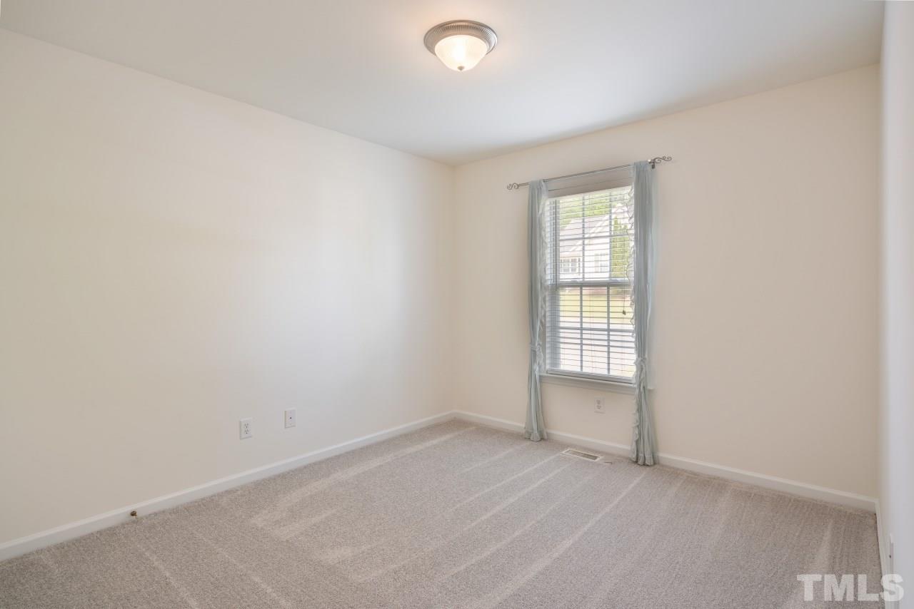 616 Rookwood Court Wake Forest, NC 27587 - Photo 22 of 30 an empty room with a window