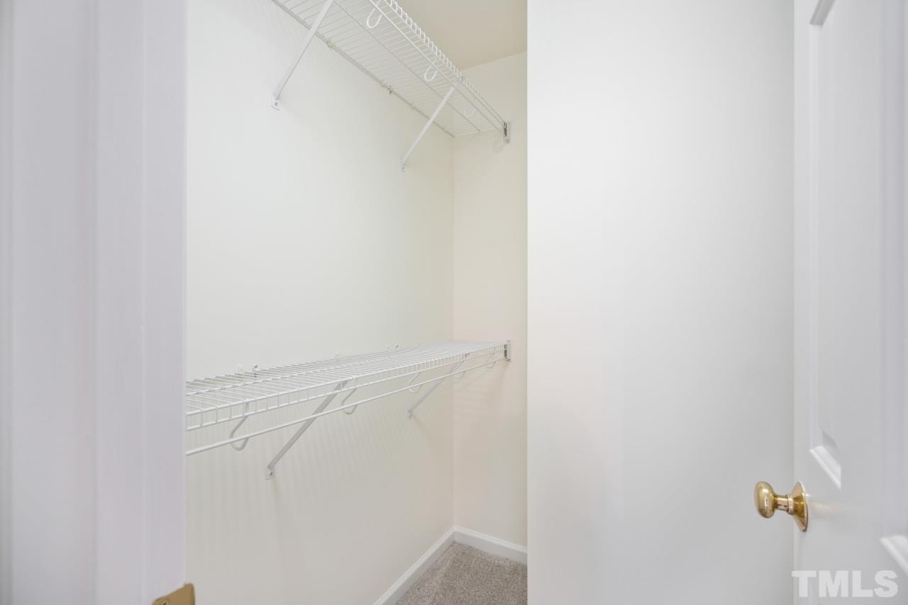 616 Rookwood Court Wake Forest, NC 27587 - Photo 27 of 30 a view of small space with racks on the wall