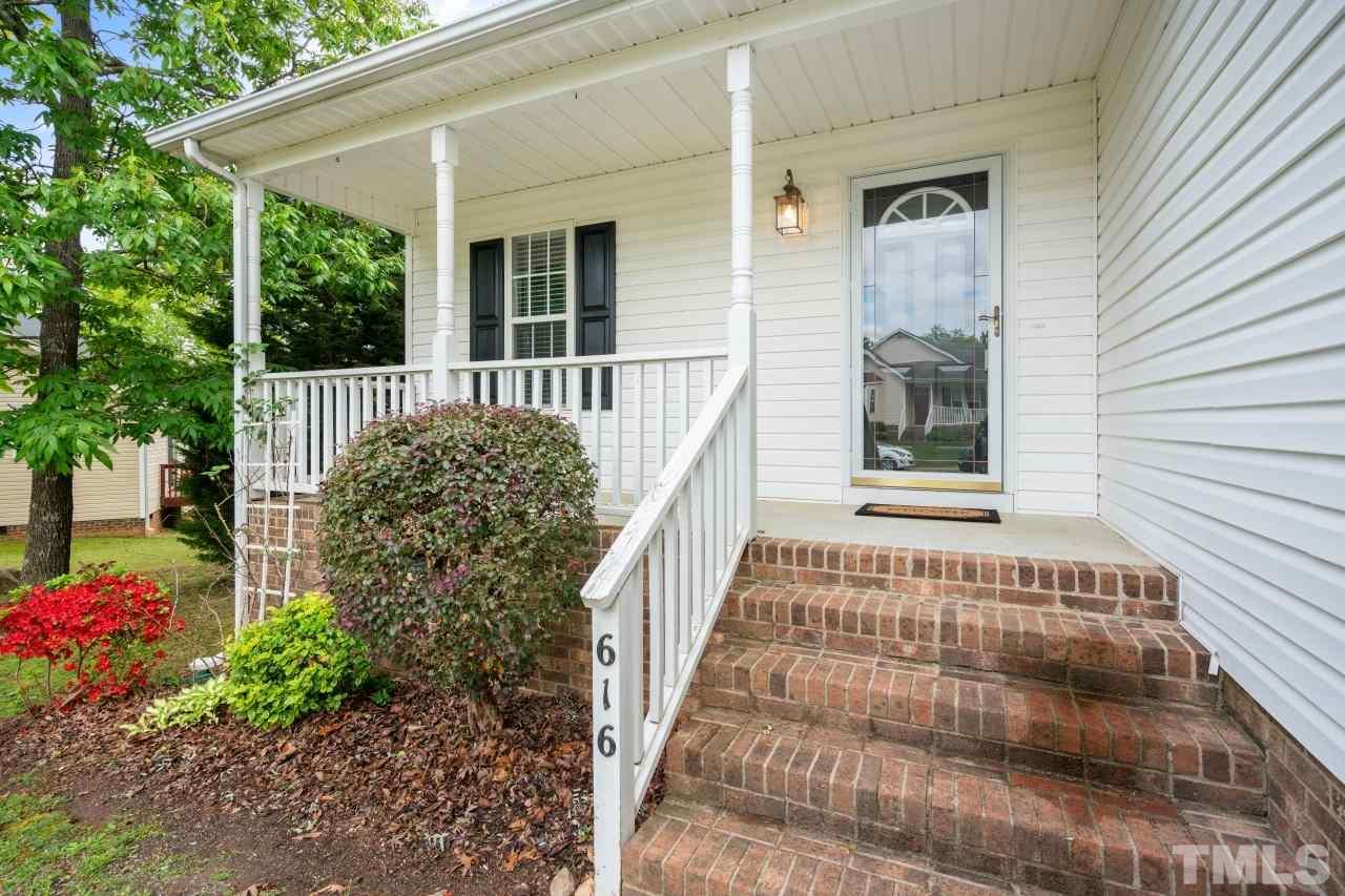 616 Rookwood Court Wake Forest, NC 27587 - Photo 4 of 30 a view of a house with a flower garden