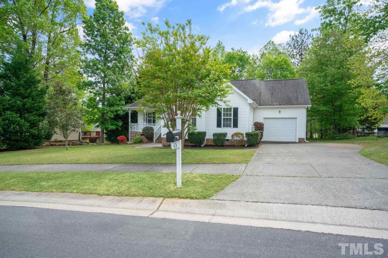 616 Rookwood Court Wake Forest, NC 27587 - Photo 7 of 30 a front view of house with yard and green space