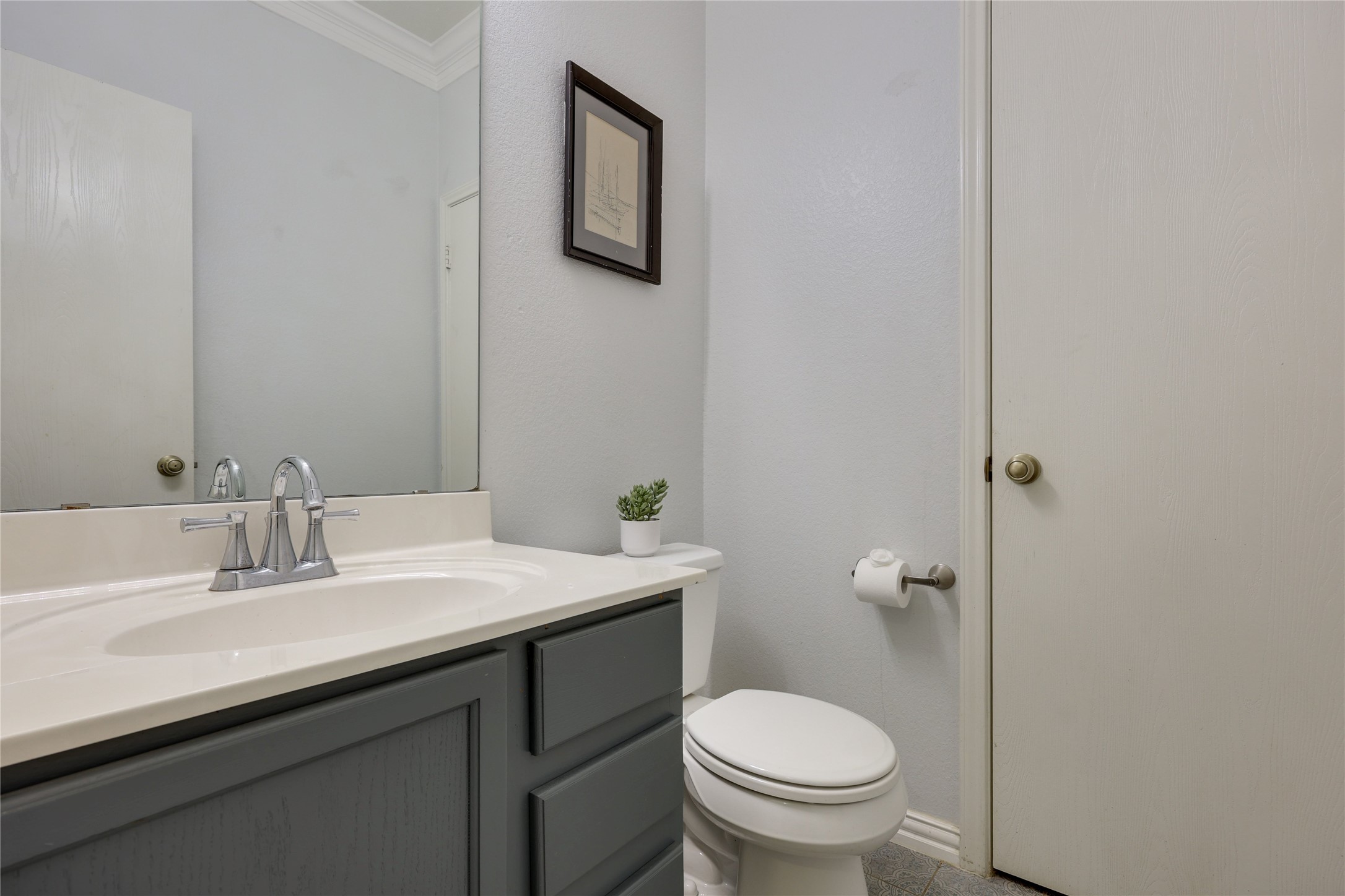 122 Avenida Brisa Fresca Road Kyle, TX 78640 - Photo 19 of 36 Downstairs half bathroom nestled by the garage for privacy