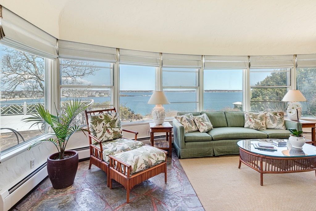 775 Boston Neck Road Narragansett, RI 02882 - Photo 13 of 47 Sunroom with fireplace