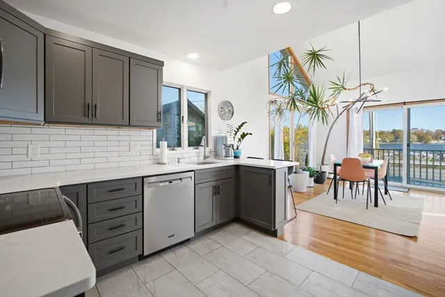 a spacious bathroom with a sink a mirror and a bathtub