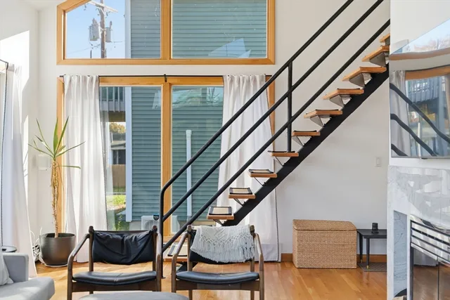 a view of an chairs and with furniture and stairs