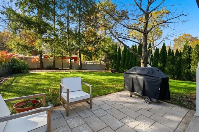 a garden view with a seating space