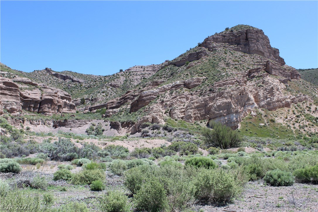 Rainbow Canyon Caliente, NV 89008 - Photo 11 of 13 Viewing East towards Rainbow Canyon rock walls on the property.
