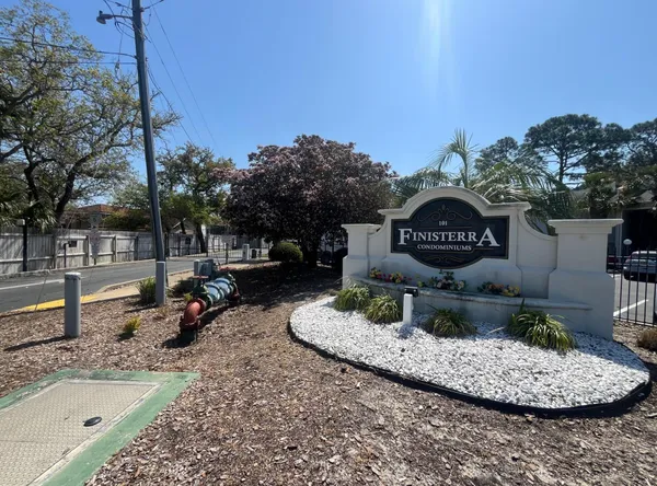 a view of street with parked cars