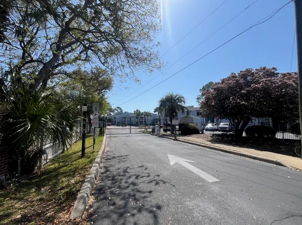 a view of a street with cars