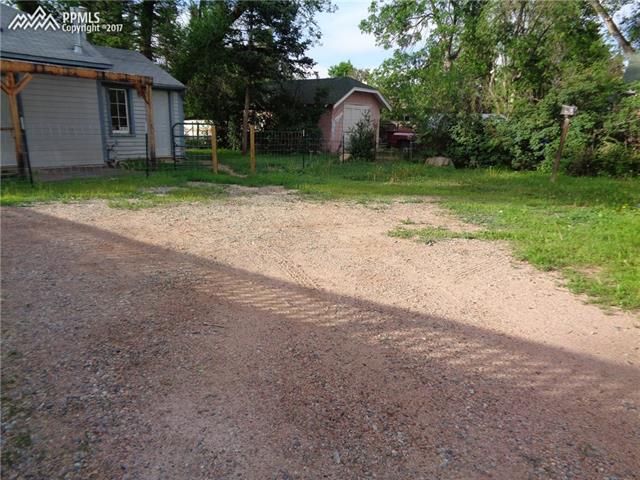 318 West Cheyenne Road Colorado Springs, CO 80906 - Photo 33 of 36 Another large parking area between the house and cottage.